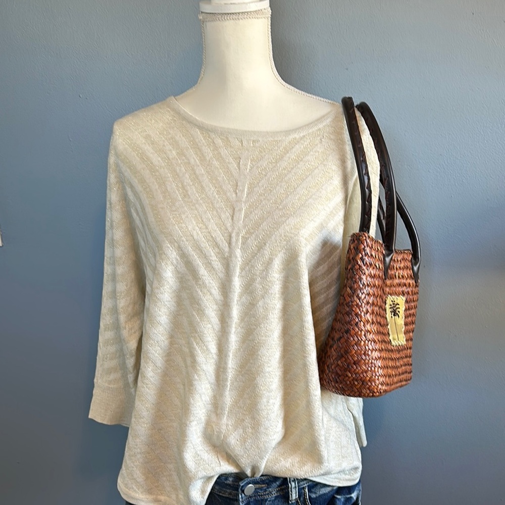 Elegant white and gold shimmer top